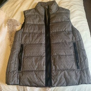 Black and white vest